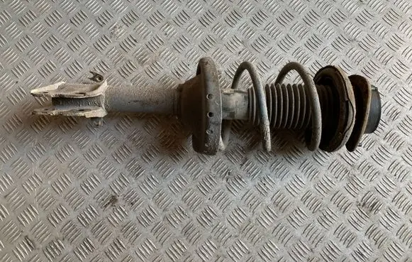 Subaru Outback Front shock absorber with coil spring