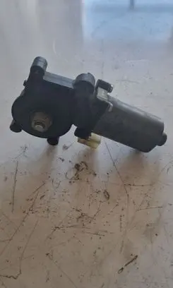 BMW 3 E46 Rear door window regulator motor 0130821727