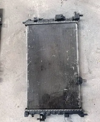 Opel Corsa D Coolant radiator 13100381