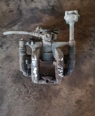 Opel Astra J Rear brake caliper