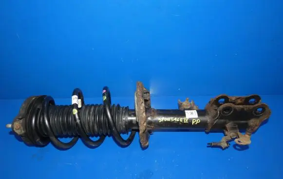 KIA Sportage Front shock absorber with coil spring 