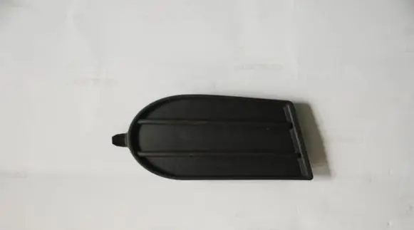 Suzuki Swift I Front fog light trim/grill