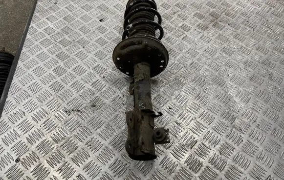 Opel Corsa D Front shock absorber/damper 13343100