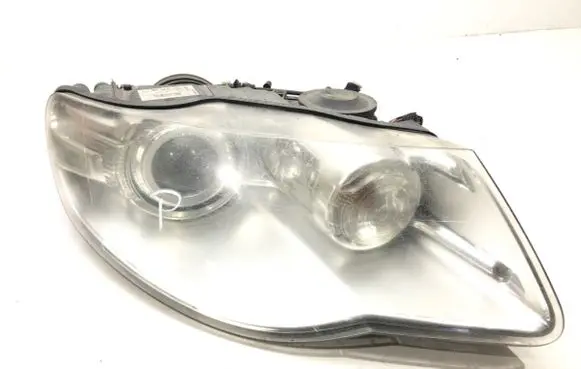 Volkswagen Touareg I Headlight/headlamp 7L6941032C