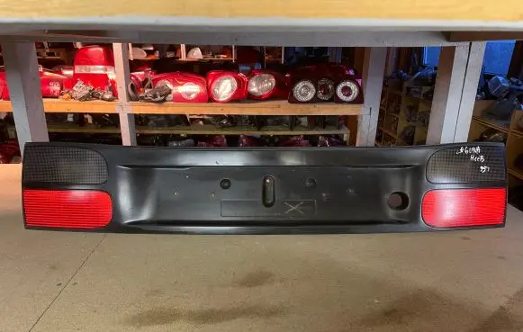 Renault Laguna I Trunk door license plate light bar 22260004 7701038277