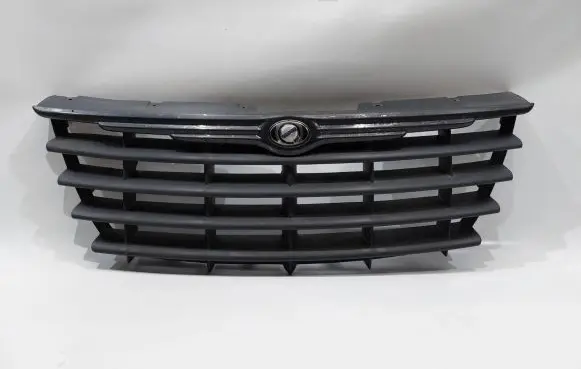 Chrysler Grand Voyager IV Front bumper upper radiator grill 04857960AA