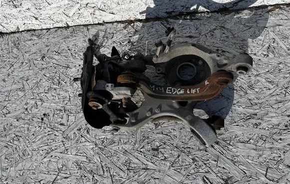 Rear wheel hub spindle/knuckle