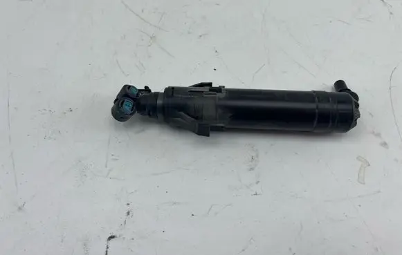 Volkswagen PASSAT B7 Headlight washer spray nozzle 3AA955104