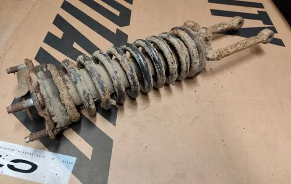 Jeep Cherokee III KJ Front shock absorber with coil spring