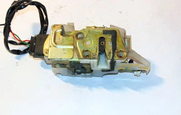 Mazda 323 Rear door lock B01A73310J