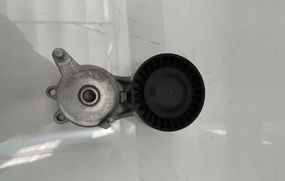 Generator/alternator belt tensioner