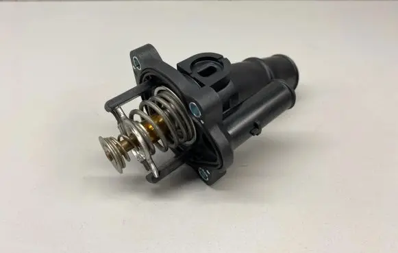 Thermostat/thermostat housing