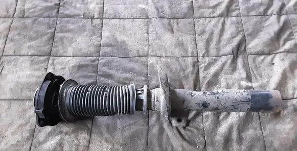 Volkswagen Eos Front shock absorber/damper 1T0413031HM