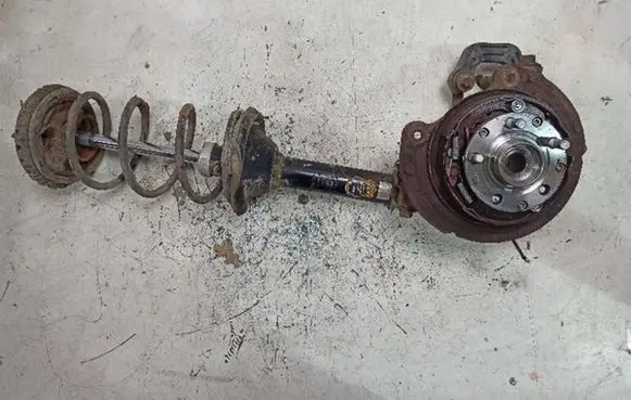 Subaru Forester SF Front shock absorber with coil spring 423093JP