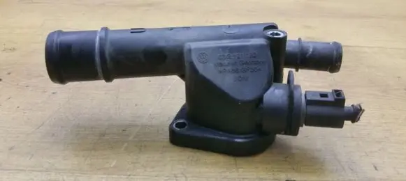 Thermostat/thermostat housing