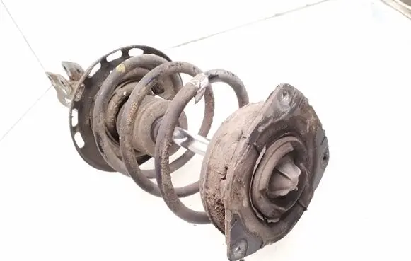 Renault Megane III Front shock absorber with coil spring