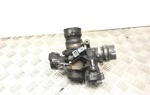 Thermostat/thermostat housing