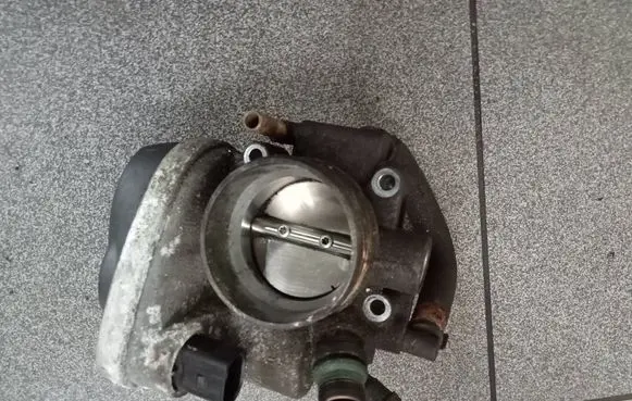 Opel Astra G Throttle valve 55560398 A2C53119795 140209M