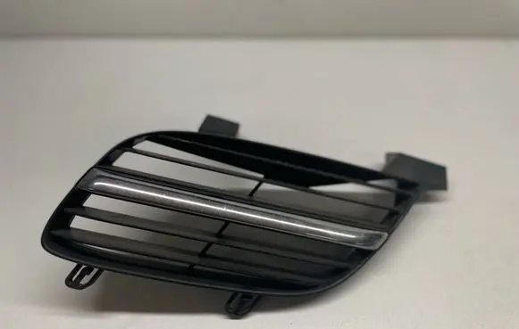 Nissan Almera Tino Front bumper upper radiator grill 62332BM400