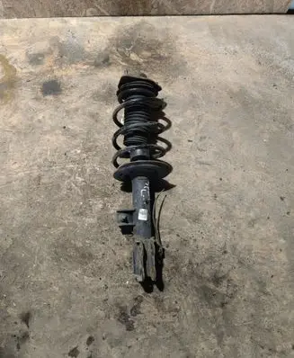 KIA Sportage Front shock absorber with coil spring 