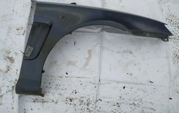Hyundai Coupe Fender melynas