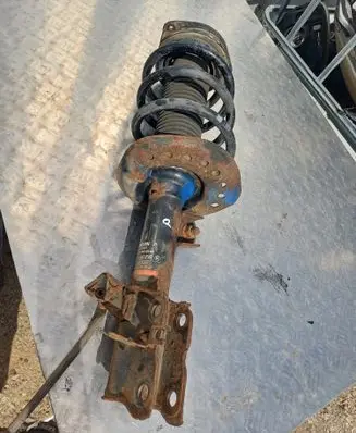 Nissan Qashqai Front shock absorber with coil spring 54303BR04A