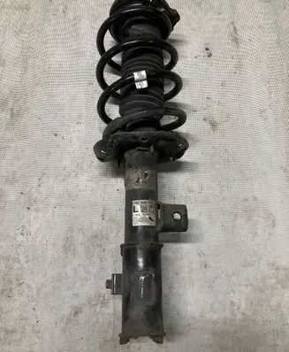 Front shock absorber with coil spring