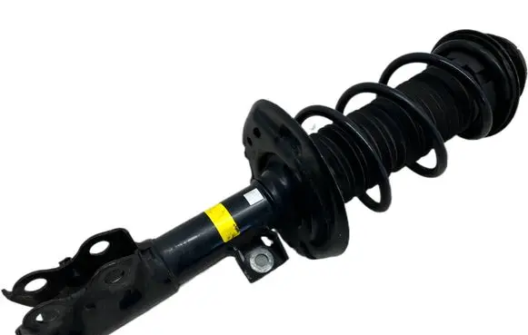Toyota Yaris XP210 Front shock absorber with coil spring