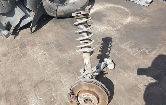 Volkswagen PASSAT B7 Front wheel hub spindle knuckle 