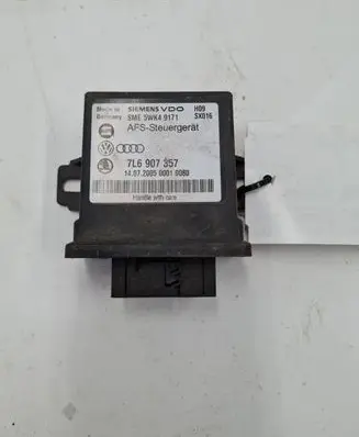 Volkswagen Touareg I Light module LCM 7L6907357