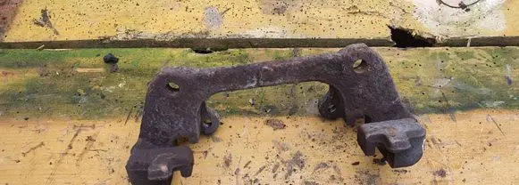 Volvo S60 Front Brake Caliper Pad/Carrier 
