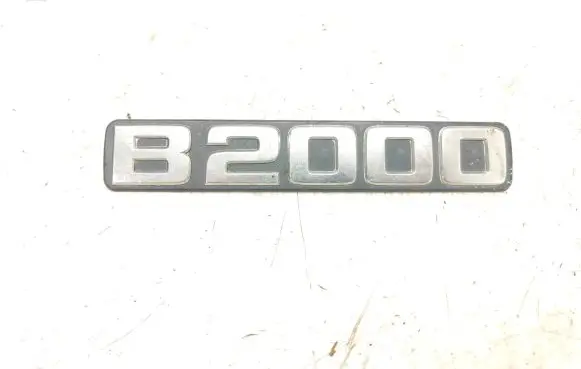 Mazda B series UF Front door emblem/model letters DOIUB3951720
