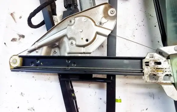 Sliding door window regulator with motor