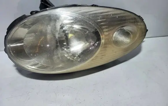 Nissan Micra Headlight/headlamp 26010AX700 89007102