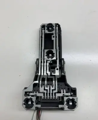 Tail light bulb cover holder