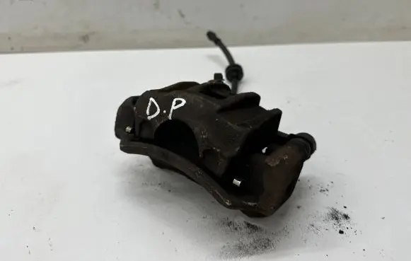 Dacia Spring Front brake caliper