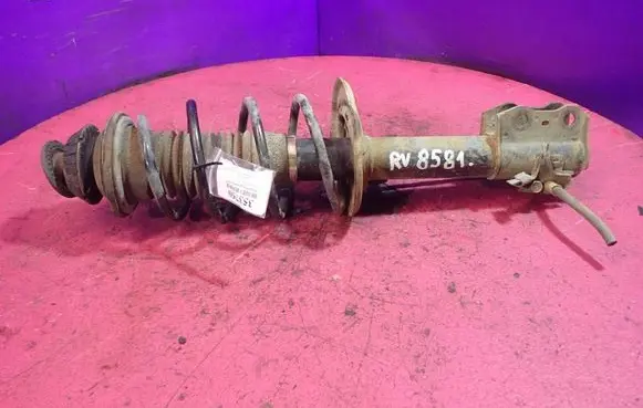 Toyota Yaris Front shock absorber with coil spring