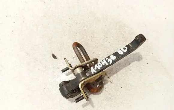 Front door check strap stopper