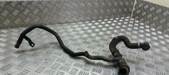 Volkswagen PASSAT B8 Engine coolant pipe/hose 04L121065
