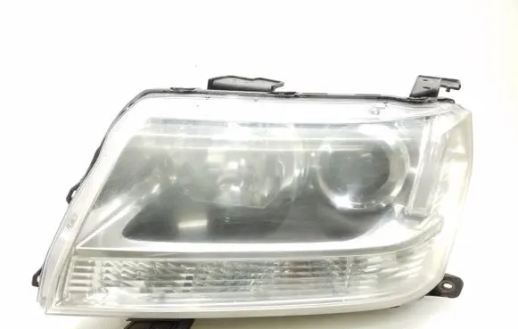 Suzuki Grand Vitara II Headlight/headlamp KOITO10059079 W3T15971