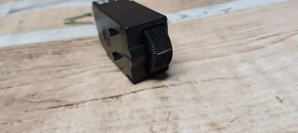Headlight level height control switch
