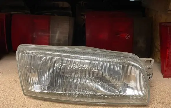 Mitsubishi Lancer Headlight/headlamp 7022 00117027