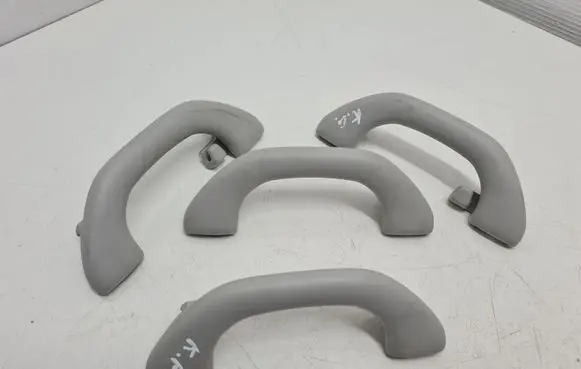 Volkswagen PASSAT B7 A set of handles for the ceiling 1K0857607N 1K0857607M