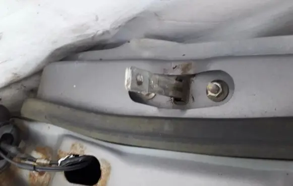 Mazda 121 Front door check strap stopper 