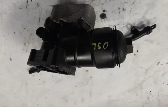 Volkswagen Golf VII Oil filter mounting bracket 03L117021C