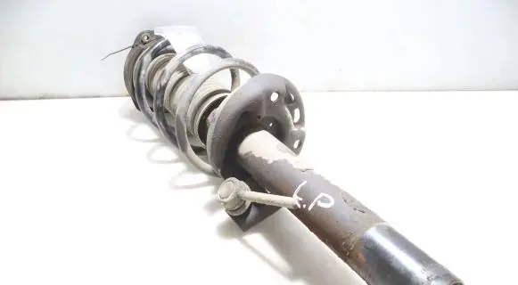 Seat Leon (1P) Front shock absorber with coil spring