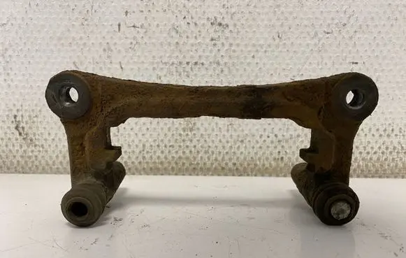 Mitsubishi Grandis Brake caliper pad carrier rear MN116285