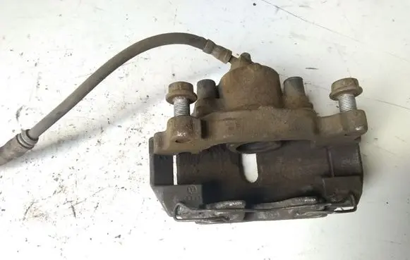 Volkswagen Golf V Front brake caliper