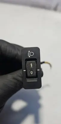 Headlight level height control switch