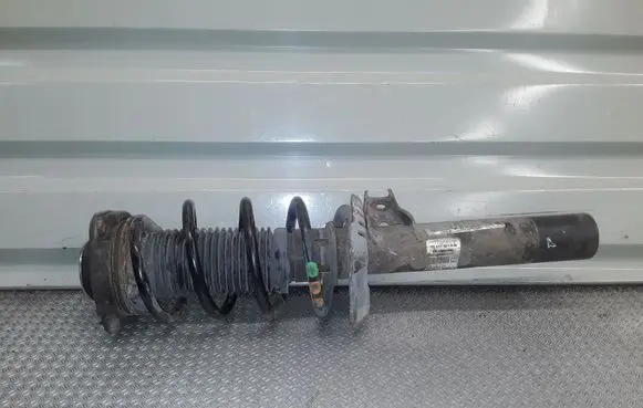 Volkswagen Touran I Front shock absorber with coil spring 1T0413031